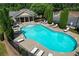 Relaxing community pool area, complete with lounge chairs and a covered area for residents at 1804 Evadale Ct # 1, Mableton, GA 30126