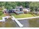Beautiful lakefront home with a long private dock, inviting pool area, and meticulously maintained grounds at 2775 Club Valley Ct, Jonesboro, GA 30236