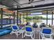 Covered boat dock with boat, jet skis, and seating with lake view at 2775 Club Valley Ct, Jonesboro, GA 30236