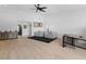 Bright living area featuring high ceilings, hardwood floors, and comfortable seating area at 2775 Club Valley Ct, Jonesboro, GA 30236