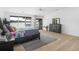 Spacious main bedroom with a large bed, bedside table and dresser with views of the water at 2775 Club Valley Ct, Jonesboro, GA 30236