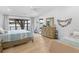 Bright main bedroom with lake views, hardwood floors, and a spacious layout at 2775 Club Valley Ct, Jonesboro, GA 30236