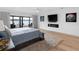 Light filled main bedroom features deck access, a fireplace, and lake views at 2775 Club Valley Ct, Jonesboro, GA 30236