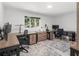 Spacious office with multiple workstations, natural light, and neutral decor for productivity at 2775 Club Valley Ct, Jonesboro, GA 30236