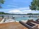 Inviting pool featuring a hot tub and lake access, perfect for relaxation and enjoying waterfront activities at 2775 Club Valley Ct, Jonesboro, GA 30236