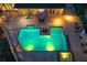 Aerial view highlighting the pool with lighting, patio furniture, and surrounding landscaping for ultimate relaxation at 2885 Coles Way, Atlanta, GA 30350