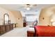 Bedroom with warm lighting, neutral color scheme and ceiling fan at 2885 Coles Way, Atlanta, GA 30350