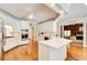 This is a lovely kitchen with hardwood floors, white cabinets, and ample counter space at 2885 Coles Way, Atlanta, GA 30350