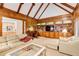 Spacious living room features built-in shelves, wood paneling, and comfortable couches at 2885 Coles Way, Atlanta, GA 30350