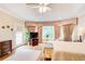 Bright main bedroom with hardwood floors, tray ceilings, and large windows at 2885 Coles Way, Atlanta, GA 30350