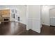 Open-concept living area showcases hardwood floors, a stone fireplace, and natural light at 374 Lamancha Ct, Lawrenceville, GA 30044