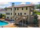 Spacious backyard featuring a swimming pool, deck, patio, and landscaped surroundings at 1344 Hamilton Creek Nw Dr, Kennesaw, GA 30152