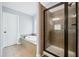 Bathroom with a tiled walk-in shower and a soaking tub with tile surround at 1344 Hamilton Creek Nw Dr, Kennesaw, GA 30152