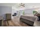 Large bedroom with hardwood floors, ceiling fan, sitting area and lots of natural light at 1344 Hamilton Creek Nw Dr, Kennesaw, GA 30152