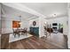 Dining room with dark hardwood floors, coffered ceilings, and wainscoting accents at 1344 Hamilton Creek Nw Dr, Kennesaw, GA 30152