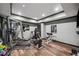 Well-equipped home gym with modern exercise equipment and ample space for workouts at 1344 Hamilton Creek Nw Dr, Kennesaw, GA 30152