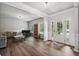 Elegant living room with hardwood floors, and a piano near the entry at 1344 Hamilton Creek Nw Dr, Kennesaw, GA 30152