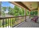 Outdoor porch with a view of the trees and landscape at 1344 Hamilton Creek Nw Dr, Kennesaw, GA 30152