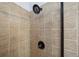 Tiled shower featuring a bronze shower head and fixture at 1344 Hamilton Creek Nw Dr, Kennesaw, GA 30152