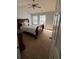 Bedroom featuring natural light from two windows and vaulted ceiling at 443 Marsh Lake Rd, Lawrenceville, GA 30045