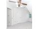 Bedroom with neutral walls, ceiling fan and sloped ceiling at 1100 Midland Way, Lawrenceville, GA 30043