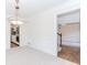 Dining room features modern lighting and access to the kitchen and rooms at 1100 Midland Way, Lawrenceville, GA 30043