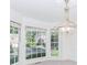 Bay window dining area with decorative lighting and outside views at 1100 Midland Way, Lawrenceville, GA 30043