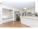 Classic kitchen with white cabinets, stainless steel appliances, and hardwood floors at 1100 Midland Way, Lawrenceville, GA 30043