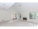 Spacious living room with fireplace, ceiling fan, and natural light at 1100 Midland Way, Lawrenceville, GA 30043