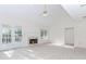 Bright living room featuring a fireplace and access to the outdoor deck at 1100 Midland Way, Lawrenceville, GA 30043