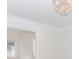 Bright living room featuring elegant chandelier and classic trim at 1100 Midland Way, Lawrenceville, GA 30043