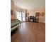 Spacious living room with hardwood floors, large windows, and ample natural light at 1581 Shetland Pony Ct, Suwanee, GA 30024