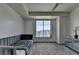 Cozy bedroom offering cityscape views, with a plush sofa and mirrored dresser providing a touch of elegance at 285 Centennial Olympic Park Nw Dr # 1905, Atlanta, GA 30339
