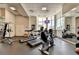 Bright gym with treadmills, exercise bikes, weights and floor to ceiling mirrors at 285 Centennial Olympic Park Nw Dr # 1905, Atlanta, GA 30339