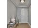 An elegant hallway with a modern console table and stylish decor at 285 Centennial Olympic Park Nw Dr # 1905, Atlanta, GA 30339