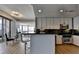 Modern kitchen featuring sleek bar seating and stainless steel appliances at 285 Centennial Olympic Park Nw Dr # 1905, Atlanta, GA 30339