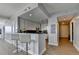 Stylish kitchen featuring a breakfast bar with seating, stainless steel appliances, and hardwood floors at 285 Centennial Olympic Park Nw Dr # 1905, Atlanta, GA 30339