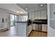 Sleek, modern kitchen with stainless steel appliances and a breakfast bar at 285 Centennial Olympic Park Nw Dr # 1905, Atlanta, GA 30339