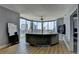 Bright living room with floor-to-ceiling windows, modern lighting, and city views at 285 Centennial Olympic Park Nw Dr # 1905, Atlanta, GA 30339