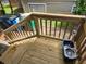 Back porch featuring new wood railing and deck at 3293 Oakcliff Rd, Doraville, GA 30340