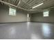 Spacious basement with newly painted floor and white walls at 420 Creekview Ct, Marietta, GA 30064