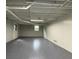 Spacious basement area featuring painted ceiling, painted walls, and epoxy floor at 420 Creekview Ct, Marietta, GA 30064