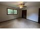 Bedroom with ceiling fan and natural light coming through the windows at 420 Creekview Ct, Marietta, GA 30064