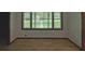Bright living room with large window offering a view of the outdoors at 420 Creekview Ct, Marietta, GA 30064