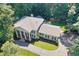 Aerial view of the home's roof, columns, skylight and patio at 575 Valley Hall Dr, Sandy Springs, GA 30350
