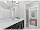 This bright bathroom is complete with a white countertop and a decorative sink at 575 Valley Hall Dr, Sandy Springs, GA 30350