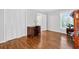 Bedroom featuring hardwood floors, closet and view to bathroom at 575 Valley Hall Dr, Sandy Springs, GA 30350