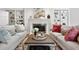 Cozy living room with a fireplace, built-in shelving, and comfortable seating at 575 Valley Hall Dr, Sandy Springs, GA 30350