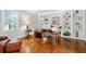 Bright home office with custom built-ins and hardwood floors at 575 Valley Hall Dr, Sandy Springs, GA 30350