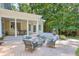 Inviting patio area with ample seating and a covered space for outdoor dining and entertaining at 575 Valley Hall Dr, Sandy Springs, GA 30350